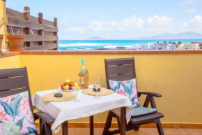 Ático de Carlo con vistas al mar y terraza